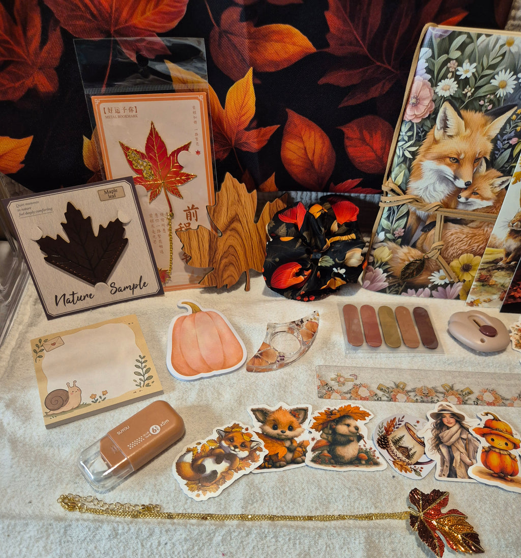 Herfstnotitieboek met bookish accessoires